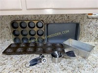 Muffin pans and other assorted baking goods