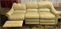 White leather couch with recliner ends by