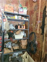 shelf full of garage contents