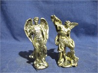 St michael l and St . Raphael statues