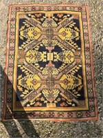 6ft by 64" Persian rug