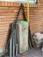 A collection of large augers + Rock