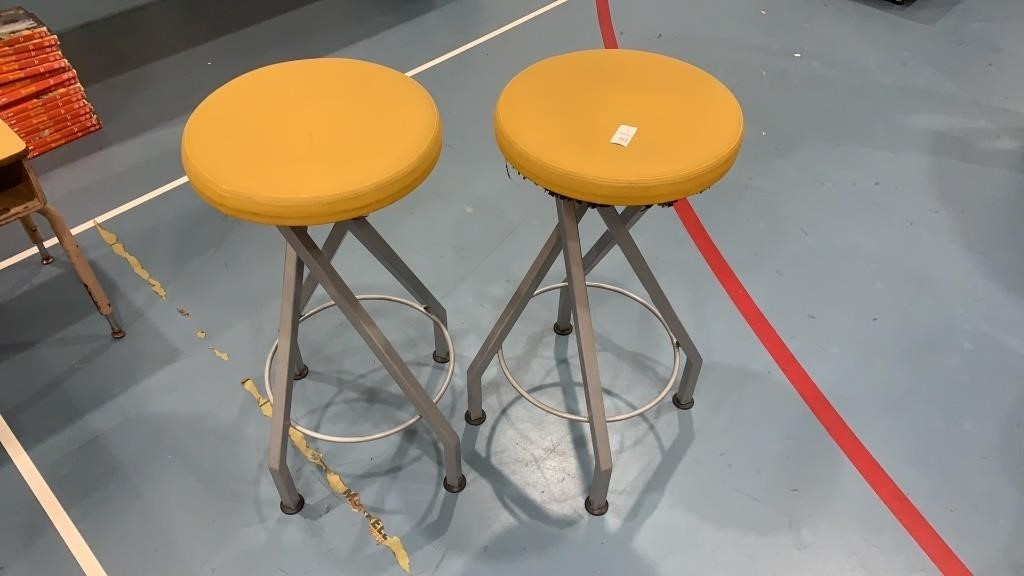 2 yellow stools 15 inches in diameter by 31