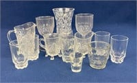 (14) Pieces of pressed glass creamers, sugar,