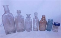 7 antique medicine bottles