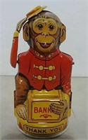 Tin toy monkey bank
