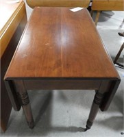 Antique solid Cherry drop leaf table