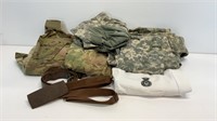 Military shirts and pants, belts, and a security
