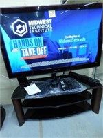 Samsung LED 7100 Flat Screen TV (58") w/ TV Stand