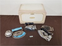 Antique irons and bread box