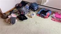 Assortment of men’s and women’s clothing, hats,