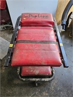 Pro Line rolling, fold-out shop seat