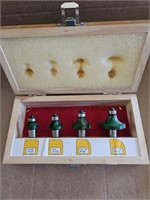 Router bits. Set of 4 in wood box.