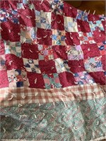 Tacked quilt appears to be full size does have