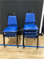 7 blue stacking chairs