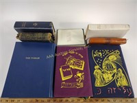 Religious texts including The Torah and The Holy