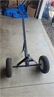 Wheel dolly mover