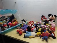 Tote of stuffed animals.