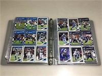 Stack of sports cards in pages
