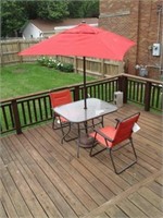 Patio glass top table with umbrella &  four chairs