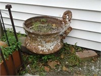 Old cast-iron flower pot handle broke off of one