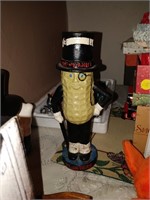 mr peanut cast iron bank with coins