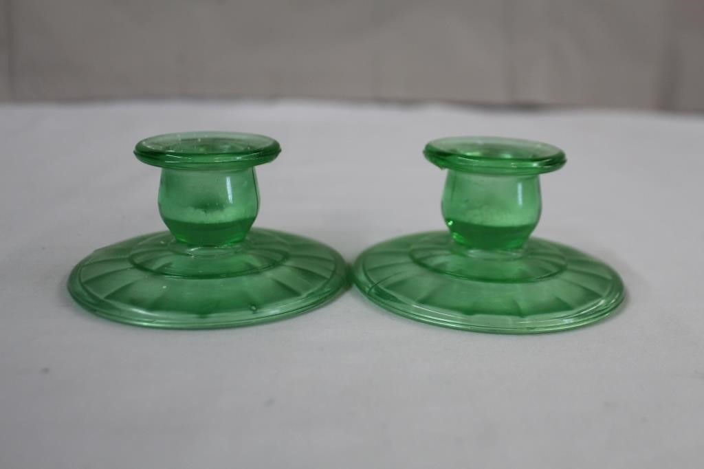 Pair of green depression glass candle sticks,