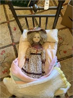 Porcelain doll 18 inch in metal doll bed
