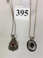 TWO STERLING SILVER PENDANTS AND FINE CHAIN