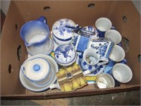 Vintage flow blue dishes with decorative pitcher.
