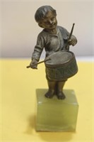 A Bronze Boy Figure on an Onyx Stand