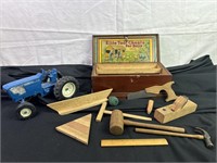 Toy tractor with toy boys tool chest