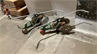 2 vintage green Tractor sprinklers
