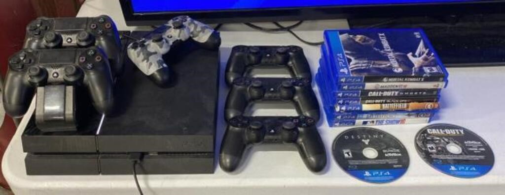PS4 with controllers and games