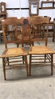 PAIR OF OAK CANE SEATED PRESSED BACK DINING CHAIRS