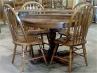 Round dining table with 4 chairs