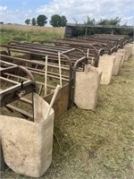 10) hog farrowing crates and feeders