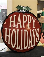 Round metal Happy Holidays sign