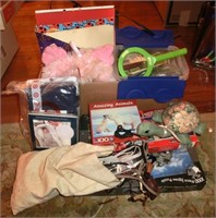box-puzzles, toys, bag of shoe laces, etc.