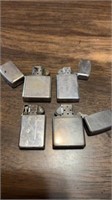 4 vintage zippo lighters