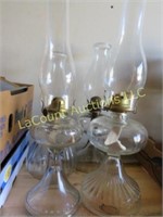 4 assorted oil lamps