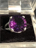 Amethyst faceted stone set in sterling silver ring