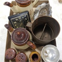 Sifter, cup, alarm clock, and teapots
