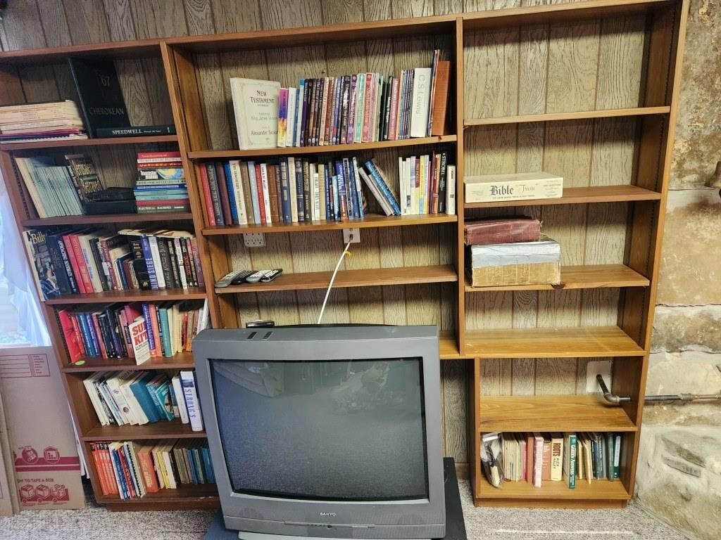 Large amount of books-shelves & TV not included