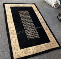 Black and Tan Wool Carpet  5’ 7"  x 3’ 6"