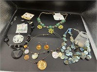 Various costume jewelry: necklaces, earrings