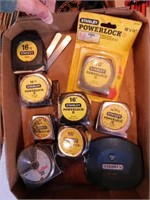 9 Stanley tape measures: 100' & 16'