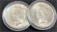 (2) AU Peace Silver Dollars In Capsules: