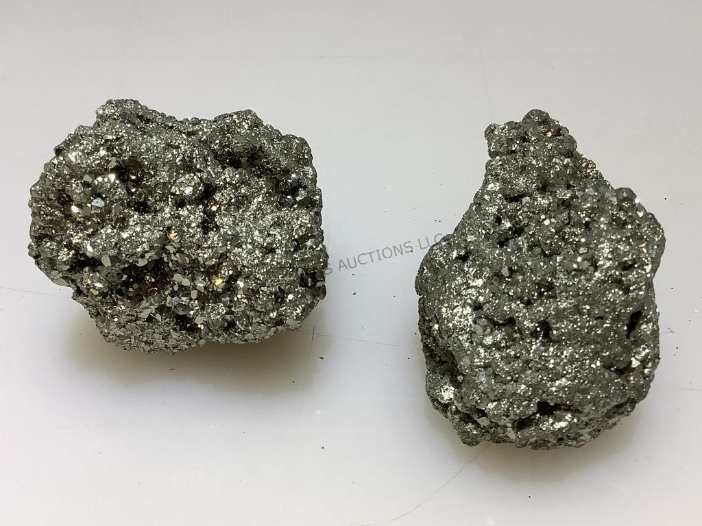 2 pyrite stone specimens.