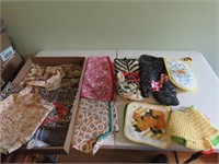 Vintage aprons, oven mitts, hot pads.